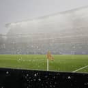 Rain falls down as play is stopped during the World Cup Group I match between France and Iraq in Philadelphia
