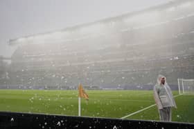 Rain falls down as play is stopped during the World Cup Group I match between France and Iraq in Philadelphia