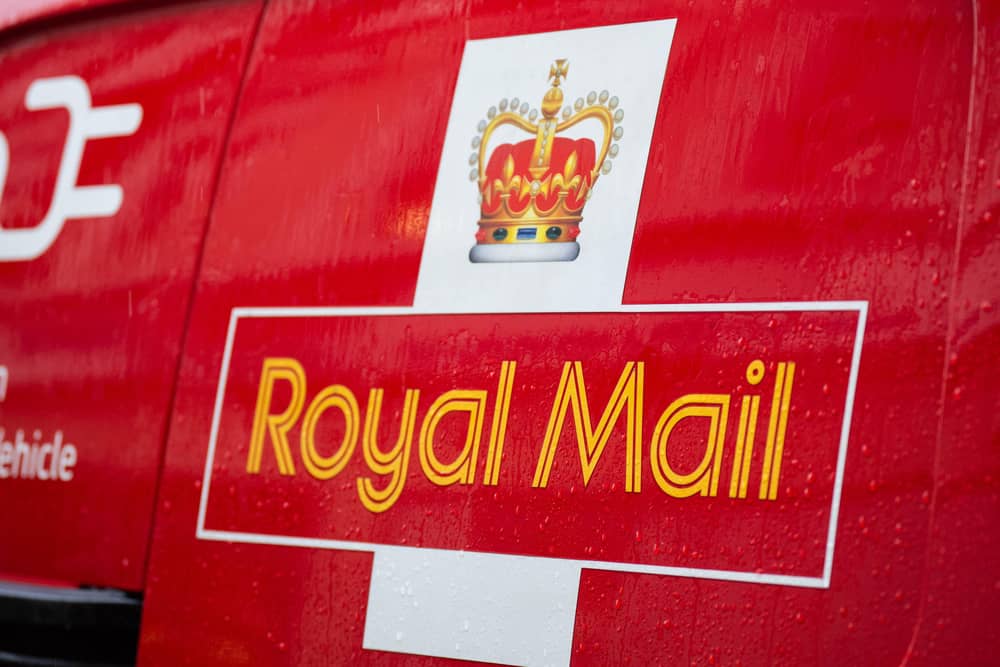 A Royal Mail logo on a van
