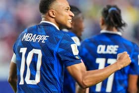 France’s Kylian Mbappe reacts after scoring his team’s second goa