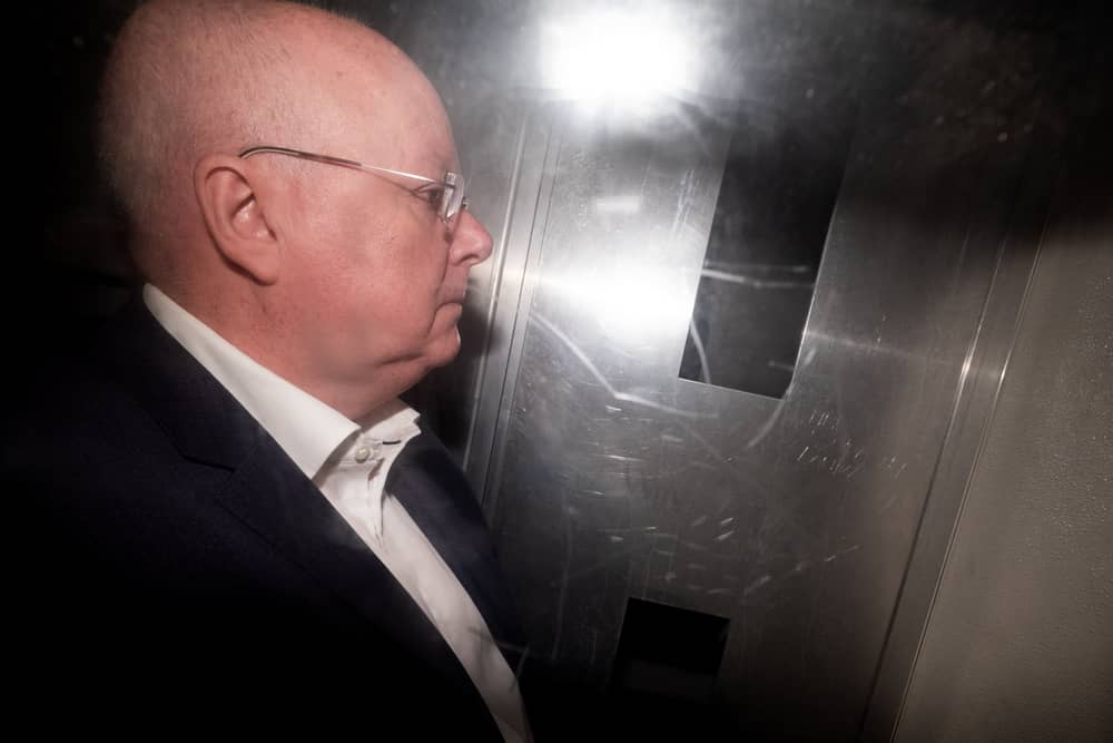 Peter Murrell leaving court in a prison van