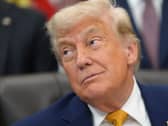 President Donald Trump pictured speaking in the Oval Office at the White House