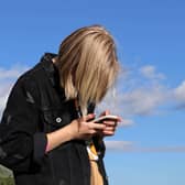 Young girl using a mobile phone