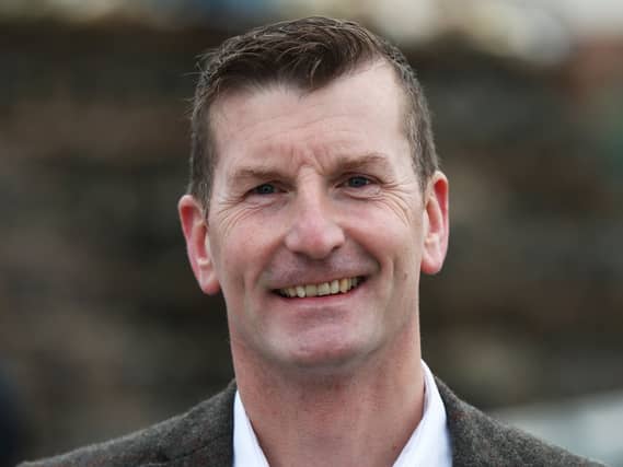Headshot of Dave Doogan smiling