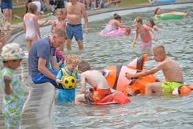  Crowds flock to Tettenhall Pool to cool down in the summer sun.