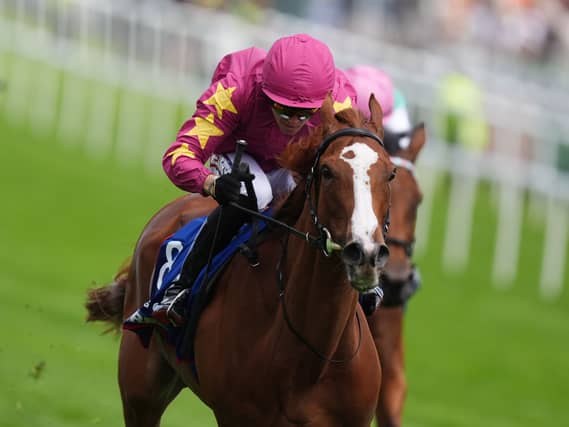 Thundering On winning the Oaks at Epsom