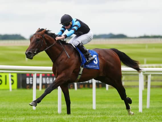 Giant Sequoia and Ryan Moore on their way to winning at the Curragh