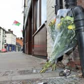 Floral tributes on Church street, Welshpool