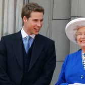 William with his grandmother Queen Elizabeth II on the balcony of Buckingham Palace