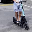 A person using an e-scooter