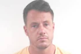 Handout mugshot of Cameron Ross