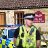 Police outside Johnsons of Old Hurst