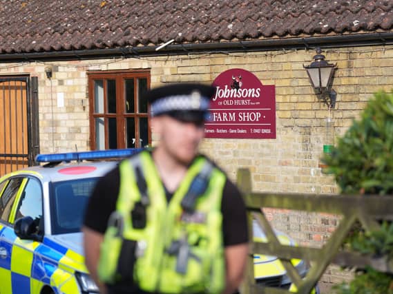 Police outside Johnsons of Old Hurst