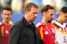 Germany manager Julian Nagelsmann appears dejected after defeat at the 2026 World Cup