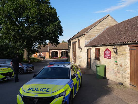 Police at Johnson’s of Old Hurst, in Huntingdonshire, last month