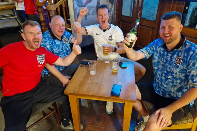 The late hour didn’t dampen the spirits of these England fans in the Crown