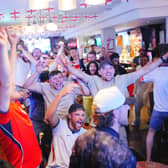 Fans watching England v Mexico