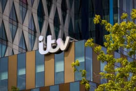 ITV logo on a building at MediaCity, Salford Quays, Greater Manchester.
