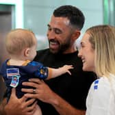 Cape Verde footballer Pico Lopes with his wife Leah and eight-month-old son Diego as he returns home after taking part in the World Cup