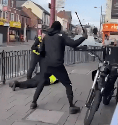 The man was seen fighting with officers prior to taking one of their batons