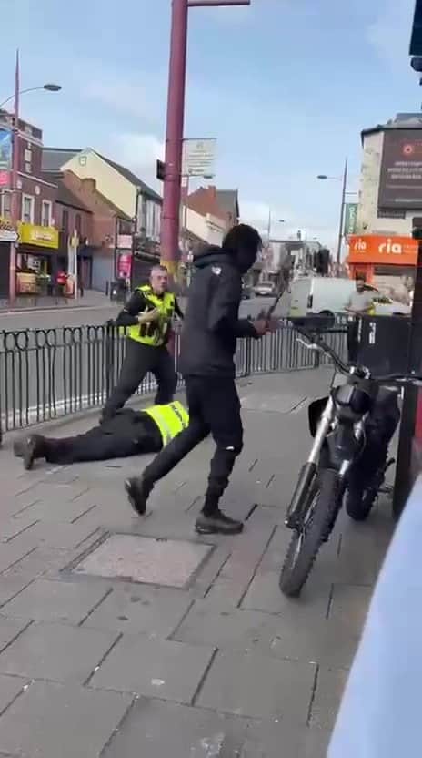The man striked an officer with an baton