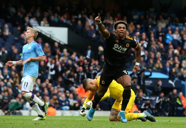Adama Traore celebrating after scoring two late goals for Wolves at Manchester City in October 2019.