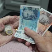 Cash in a person's hand