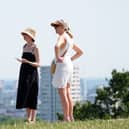 People in hats in the sun