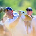 Rory McIlroy tees off