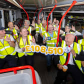 An 80‑strong syndicate of Birmingham bus drivers celebrate winning £108,510.50. 