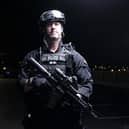 Inspector Roy Teague in firearms gear