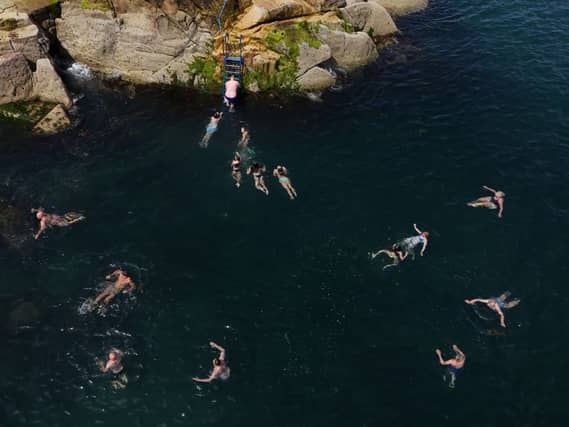 People cooling off at the Forty Foot