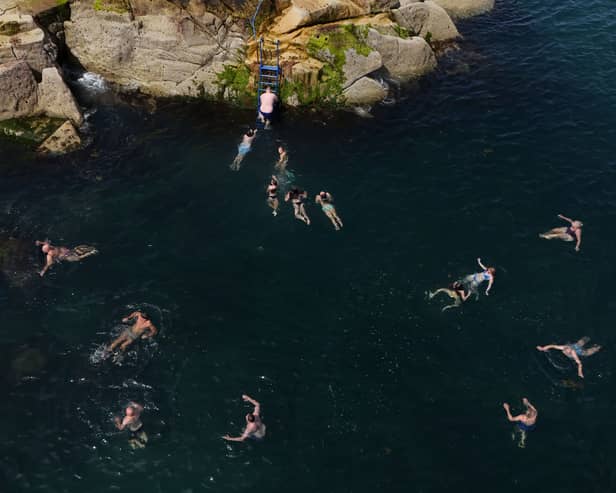 People cooling off at the Forty Foot