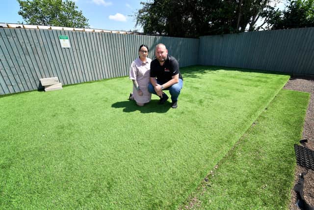 Kirstie Mitchell and Andy Laverie from the Why Not Inn in Essington, which had its bouncy castle stolen at the weekend