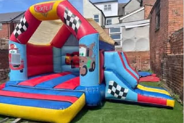 The bouncy castle was quite large and was rolled up and dragged out of the pub’s grounds