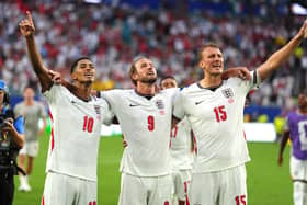 England’s Jude Bellingham, Harry Kane and Dan Burn (Martin Rickett/PA)
