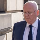 Peter Murrell walking outside court