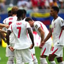 England manager Thomas Tuchel instructs Bukayo Saka at a hydration break during the 2026 World Cup quarter-final
