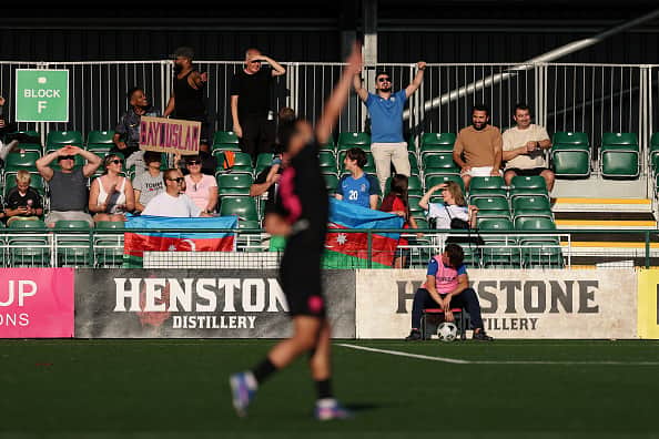 Rahman Dashdamirov and Sabah FK supporters celebrate after their second goal of the night