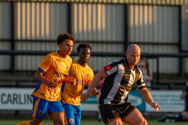 Favour Fawunmi (back, centre) in action against Stafford Rangers. Pic: Pete Wideman