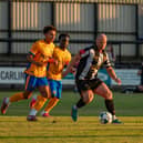 Favour Fawunmi (back, centre) in action against Stafford Rangers. Pic: Pete Wideman