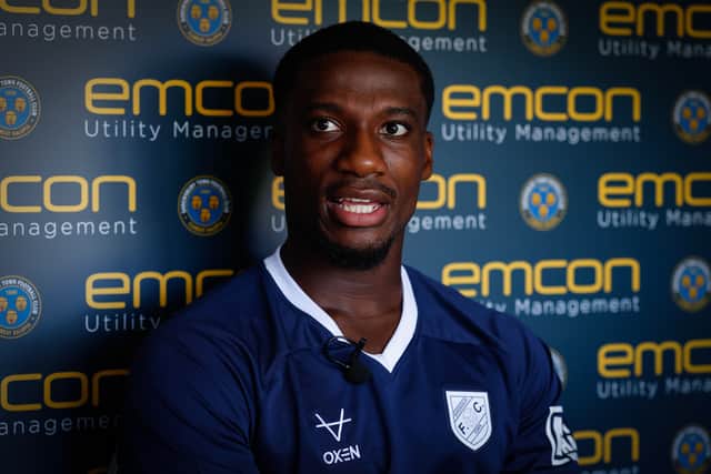 Joe Gbode has signed for Shrewsbury Town on a season-long loan deal from Luton Town