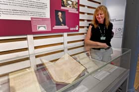 Archivist Sarah Roberts with rare Iron Bridge documents which are on now on display at the Coalbrookdale Museum of Iron.