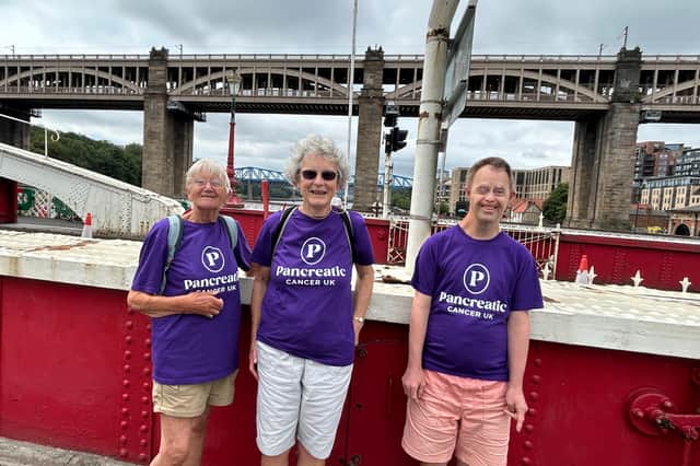 Frances Robbs with Heather and Adam on the Tyne's Swing Bridge