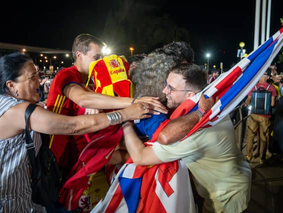 British and Spanish nationals celebrate