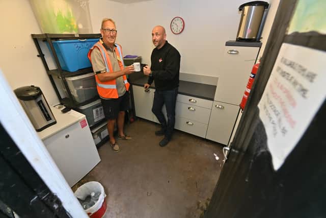 Pete McCay from Kitchen Depot with volunteer Adrian Smith.