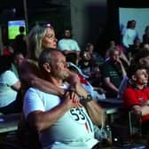 England fans react after Argentina take the lead during the World Cup semi final between England and Argentina, at the Malthouse in Ironbridge