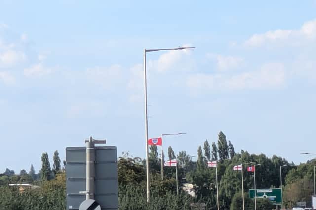 Flags are being flown on lampposts near Dobbie's roundabout in Shrewsbury to show support of the England football team