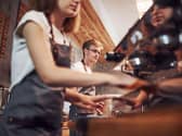 Cafe workers serving customers