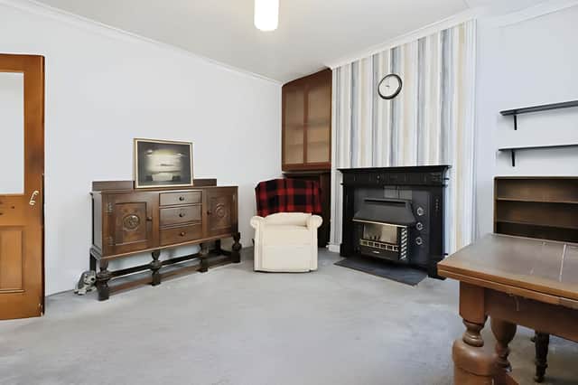 Two generous reception rooms offer flexibility to reshape the living space to suit modern life.